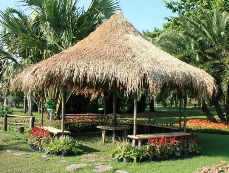 thatch hut in park free photo 768x579