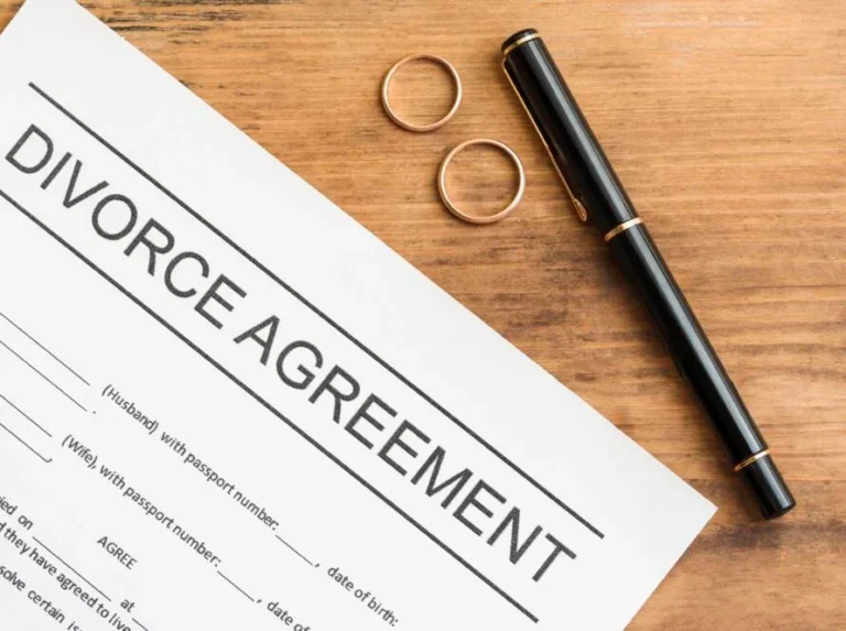 divorce agreement wooden table 890x664 1 768x573